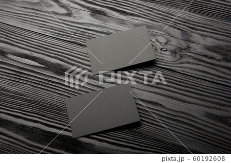 Business card blank on wooden background. Corporate Stationery, Branding Mock-up. Creative designer desk. Flat lay. Copy space for text 60192608