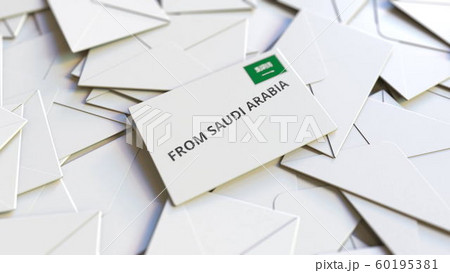 Envelope with From Saudi Arabia stamp among other envelopes. International mail related conceptual 3D rendering 60195381