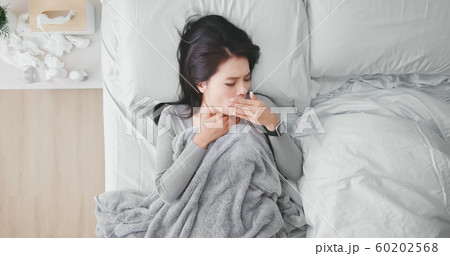 asian woman cough in bedroom 60202568