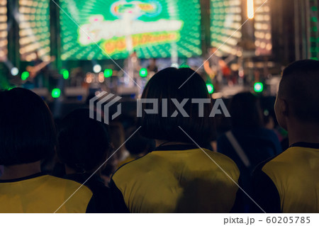 The youth in the concerts have very bright lights The youth in the concerts have very bright lights 60205785