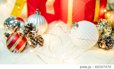 Christmas ball ornaments on hairy carpet Christmas ball ornaments on hairy carpet 60207470