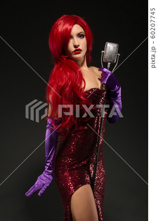 Young redhead woman retro style singer. Vintage Young redhead woman retro style singer. Vintage 60207745