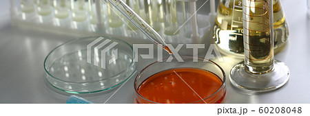Yellow liquid spilled petrol additive innovative supply Yellow liquid spilled petrol additive innovative supply 60208048
