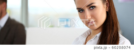 Beautiful smiling girl at workplace look in camera Beautiful smiling girl at workplace look in camera 60208074