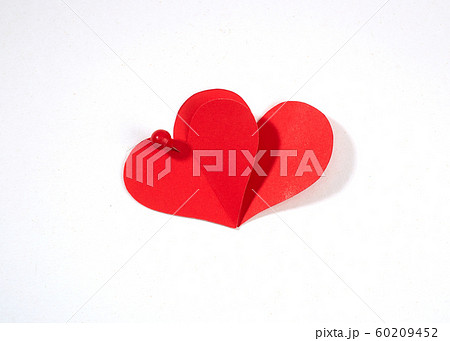 Red heart paper with red pin Red heart paper with red pin 60209452