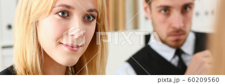 Group of people sit in office deliberate on 60209560