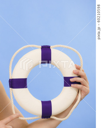 Hand holds life buoy rescue ring Hand holds life buoy rescue ring 60210598
