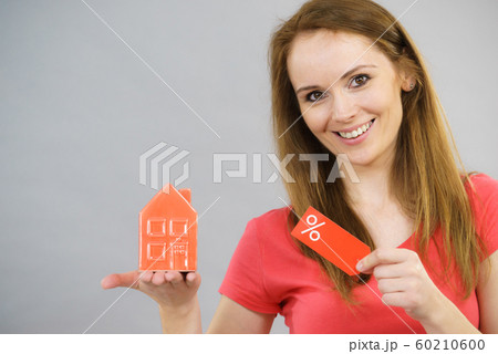 Woman buying house in low price. Woman buying house in low price. 60210600