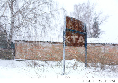 Old rusty road sign on a background of a red brick Old rusty road sign on a background of a red brick 60211398