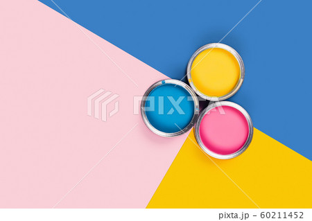 Three-colored background with paint jars. 60211452