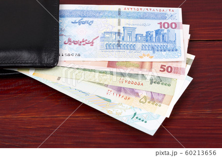 Iranian money - Rial in the black wallet Iranian money - Rial in the black wallet 60213656