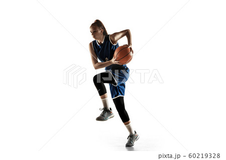 Young caucasian female basketball player against white studio background Young caucasian female basketball player against white studio background 60219328
