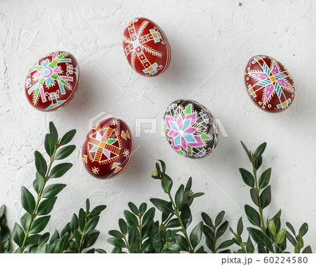 Easter eggs decorated with wax resist technique 60224580