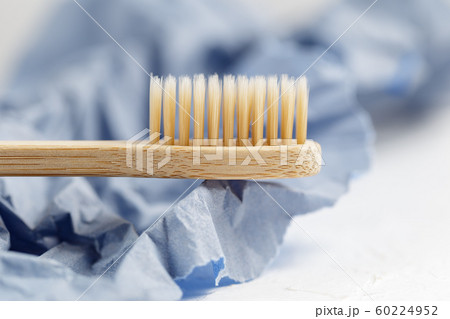 Close up of bamboo toothbrush, zero waste concept Close up of bamboo toothbrush, zero waste concept 60224952