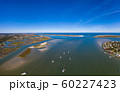 Aerial panorama of boats entering Saint Augustine Inlet in Saint Augustine, Florida 60227423