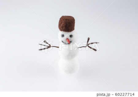 Toy Christmas winter snowman on white background 60227714