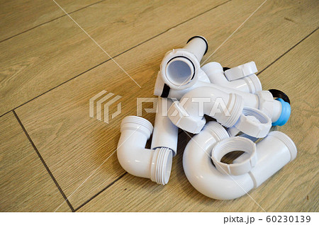 White plastic plumbing, plumbing pipes, smooth  60230139