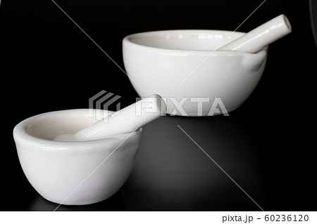 isolated white medicine mortar on dark background isolated white medicine mortar on dark background 60236120