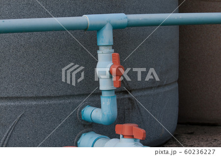 water pipe with red valve and tank water pipe with red valve and tank 60236227