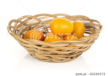 Tasty orange kumquat isolated on white Tasty orange kumquat isolated on white 60260573