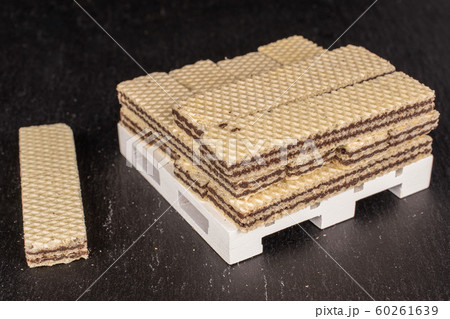 Chocolate biscuit wafer on grey stone 60261639