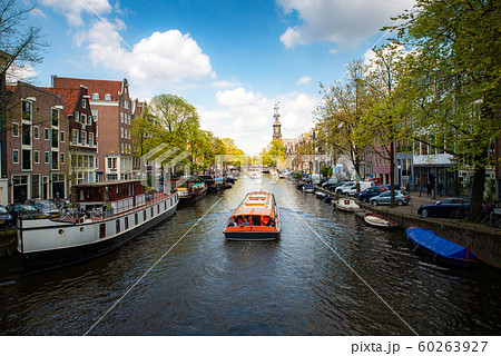Amsterdam canal with cruise ship with Netherlands 60263927