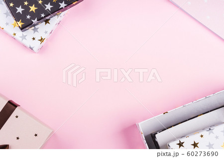 Gift boxes frame on pink. Festive concept flat lay 60273690