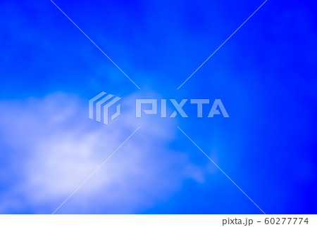 fluffy blur clouds in the bright blue sky 60277774