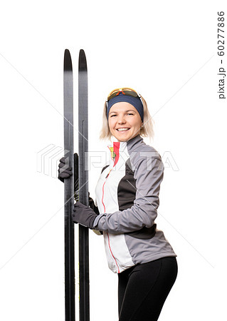 Image of happy sportswoman with skis on empty white background. Image of happy sportswoman with skis on empty white background. 60277886