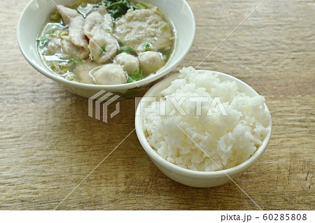 boiled soft slice pork and ball in clear soup on bowl eat with plain rice 60285808