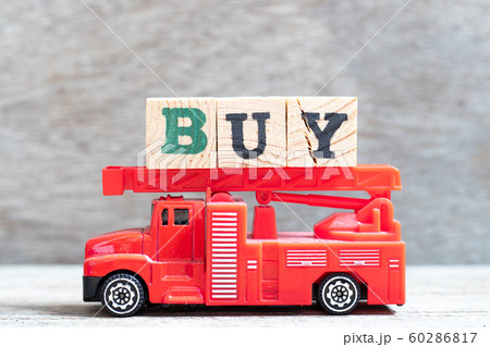 Red fire truck hold letter block in word buy Red fire truck hold letter block in word buy 60286817