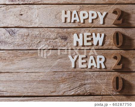 happy new year 2020 alphabet on old wood background happy new year 2020 alphabet on old wood background 60287750