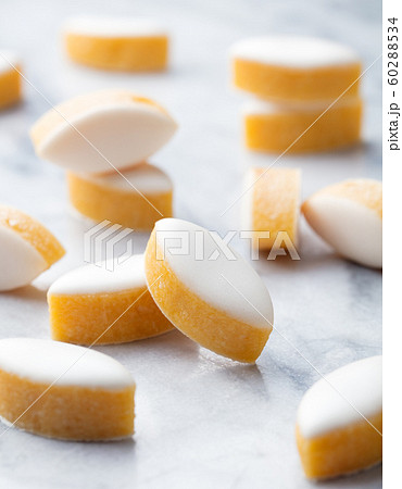 Calissons, traditional French Provence sweets on marble table background. Calissons, traditional French Provence sweets on marble table background. 60288534