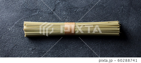 Green tea soba noodles. Top view. Copy space. Slate background. 60288741
