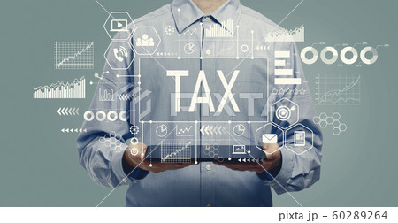 Tax theme with man holding a tablet Tax theme with man holding a tablet 60289264