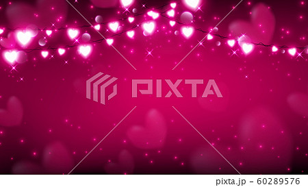 abstract of valentine background with fairy lights hanging on top and producing magic particles are dropping down 60289576