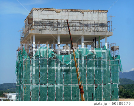 Plastic or nylon netting erected at the external of the under-construction building to prevent construction debris from falling down. Temporary installed. 60289579