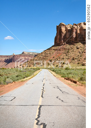 Rock formations by a road in Canyonlands National Rock formations by a road in Canyonlands National 60290562