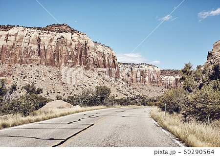 Rock formations by a road in Canyonlands National Rock formations by a road in Canyonlands National 60290564