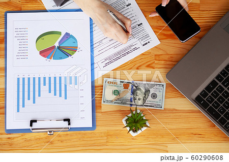 Financial Manager Sitting in Desk and Work With Financial Documents Company 60290608