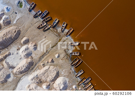 Aerial view of the small boats for salt collecting Aerial view of the small boats for salt collecting 60292106