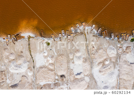 Aerial view of the small boats for salt collecting Aerial view of the small boats for salt collecting 60292134