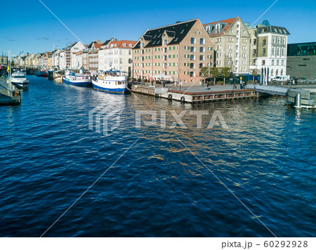 Nyhavn water front canal and touristic street 60292928