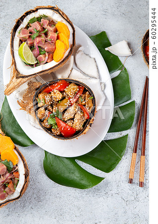 Tahitian Hawaiian dishes Thuna ceviche salad and pineapple chicken with sweet sauce 60295444