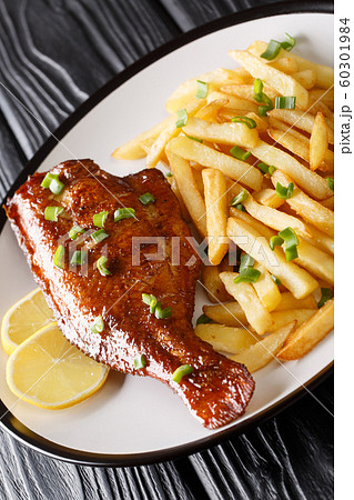 Tasty whole fried Sebastes fish served with fresh 60301984