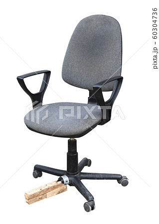 Old office chair with a piece of wood instead of a 60304736