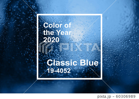Main color trend 2020 classic blue pantone. raindrops on a background of glass Main color trend 2020 classic blue pantone. raindrops on a background of glass 60306989