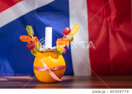Orange Christingle is a symbolic object used in the Advent, Christmas and Epiphany services of many Christian denominations 60309779
