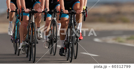 Cycling competition, cyclist athletes riding a race Cycling competition, cyclist athletes riding a race 60312799