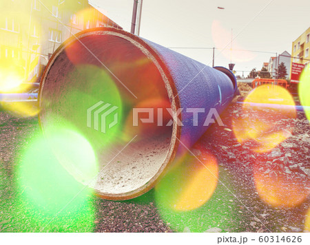 Filtered photograph of the plastic pipes in soil 60314626